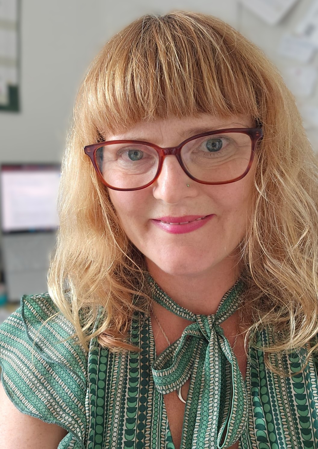 Image of Diana Wilkins with greenery behind